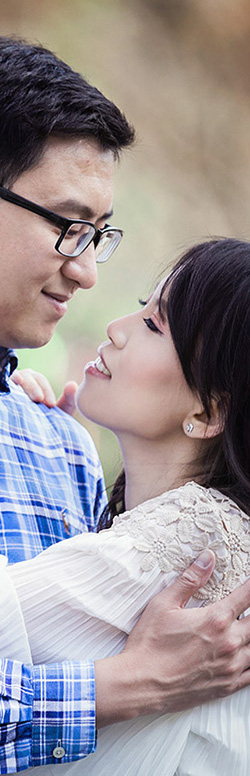 Engaged couple embracing, photographed by St. Louis wedding photographer Tracey Bartmann-Leek.